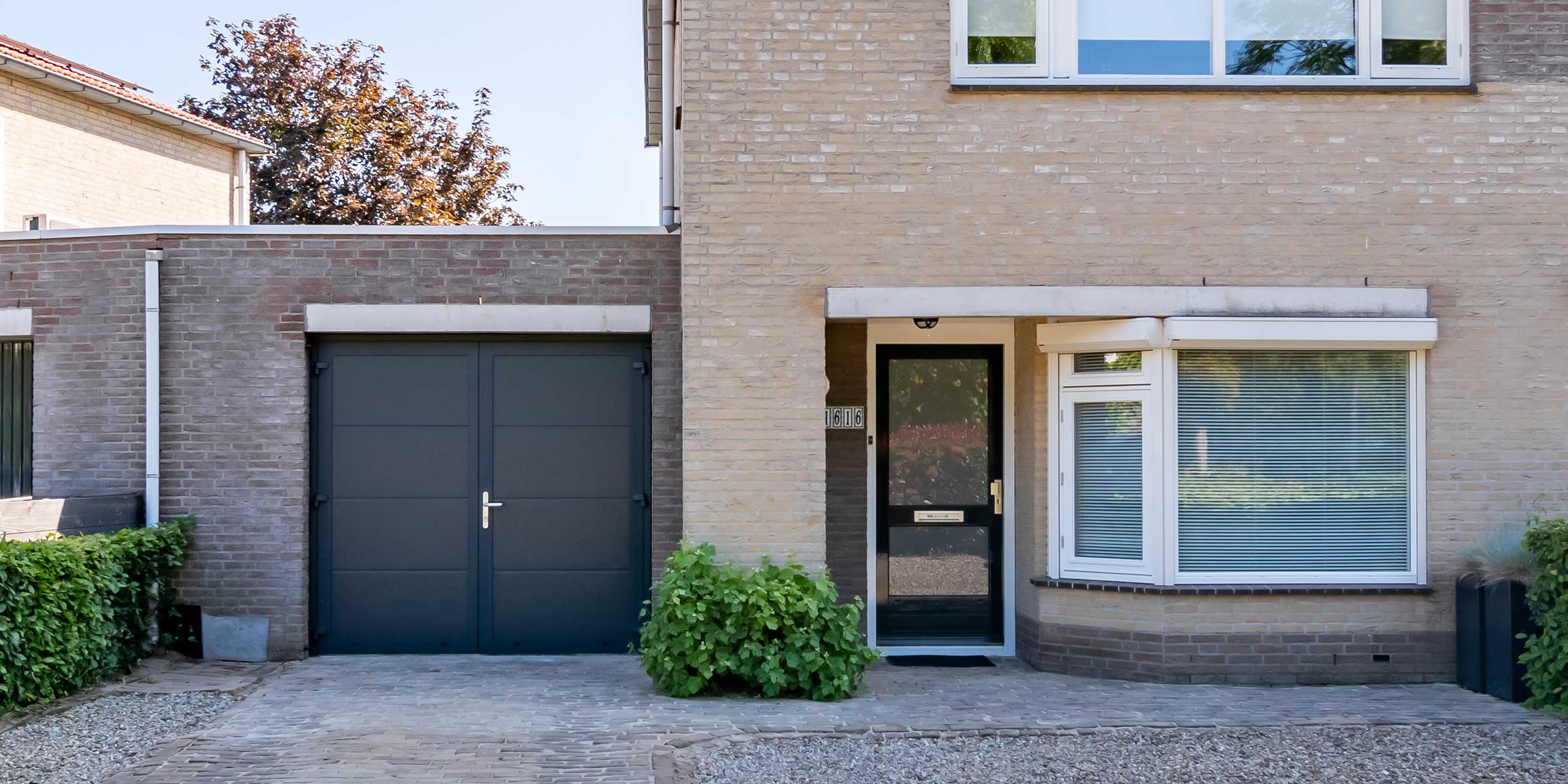 openslaande garagedeur vervangen