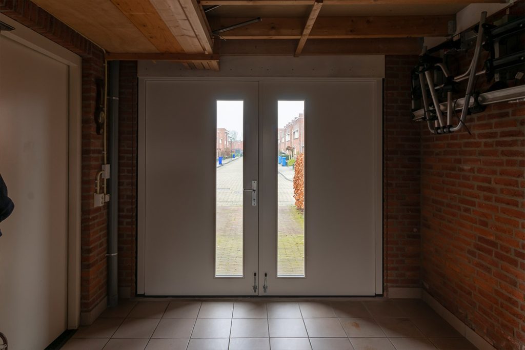 Houten openslaande deur met glas